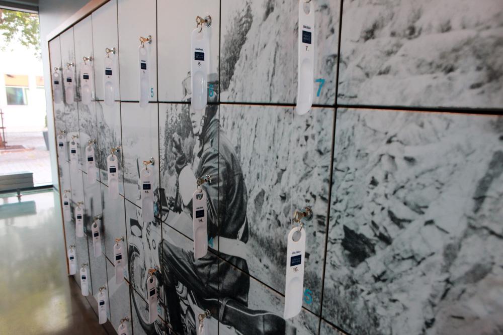 Storage lockers in the corridor of the museum, the key to the locker is in place on each door, with the museum keyring hanging on the key.